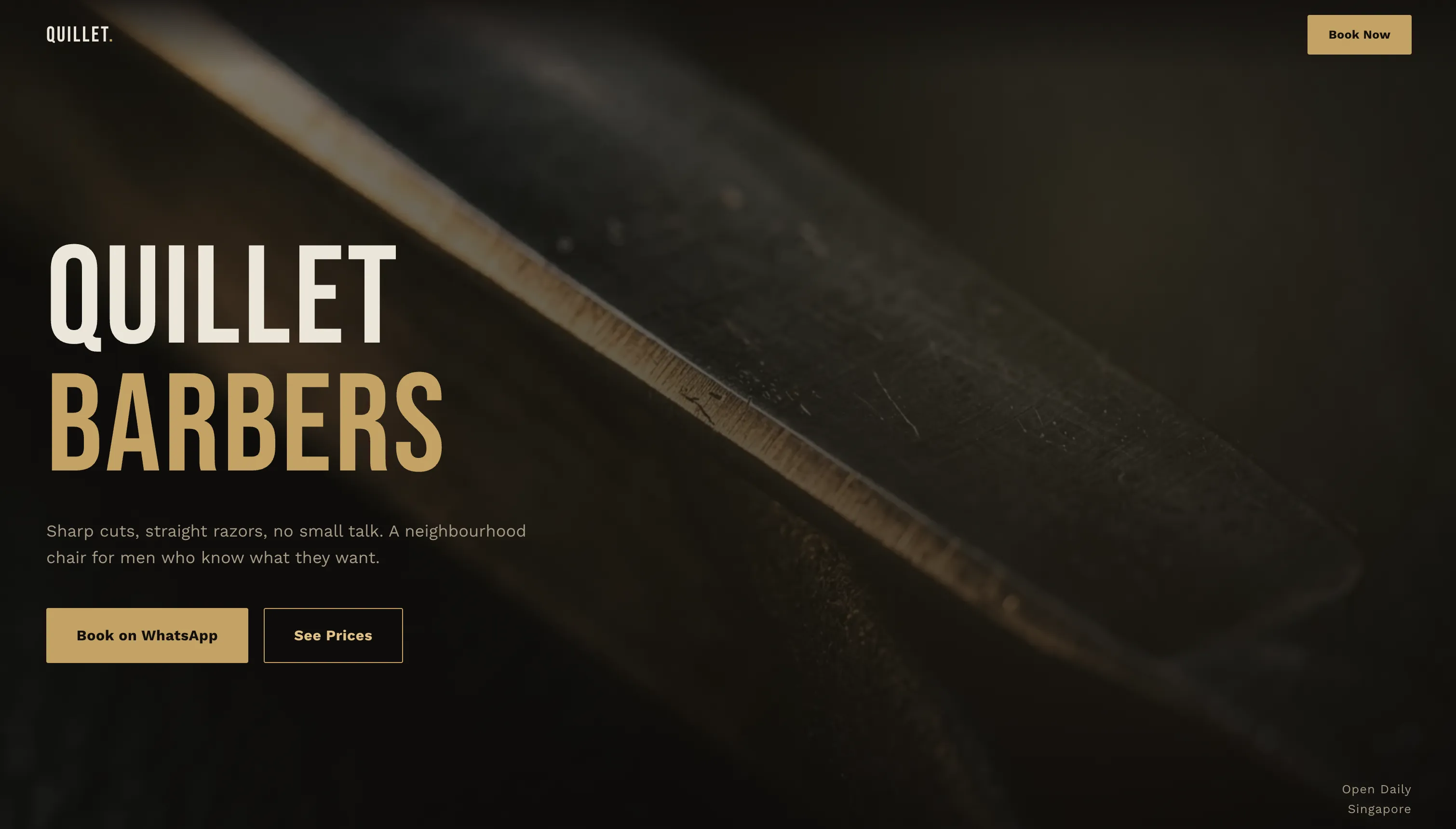 Quillet Barbers homepage, a dark barber shop website